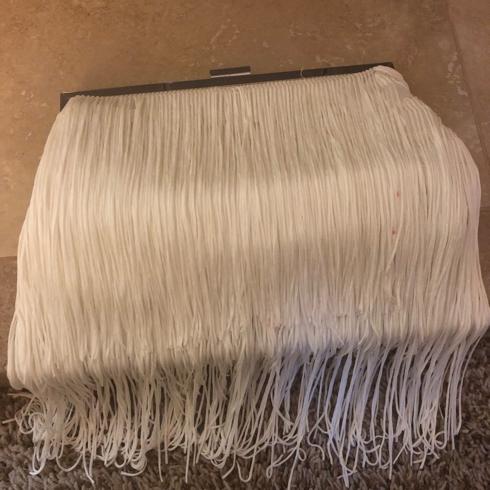 New York and company fringe clutch